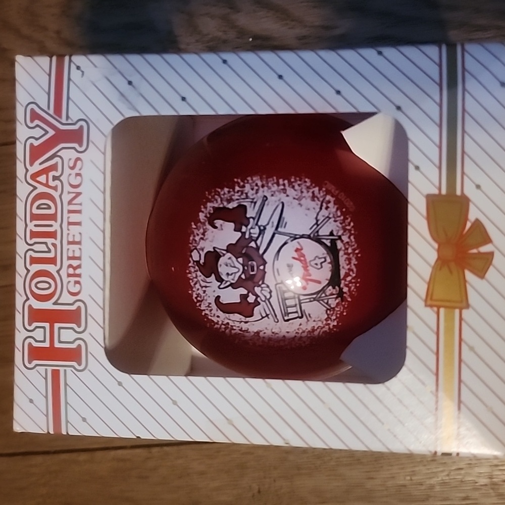Fender Christmas Bulb Elf playing drums